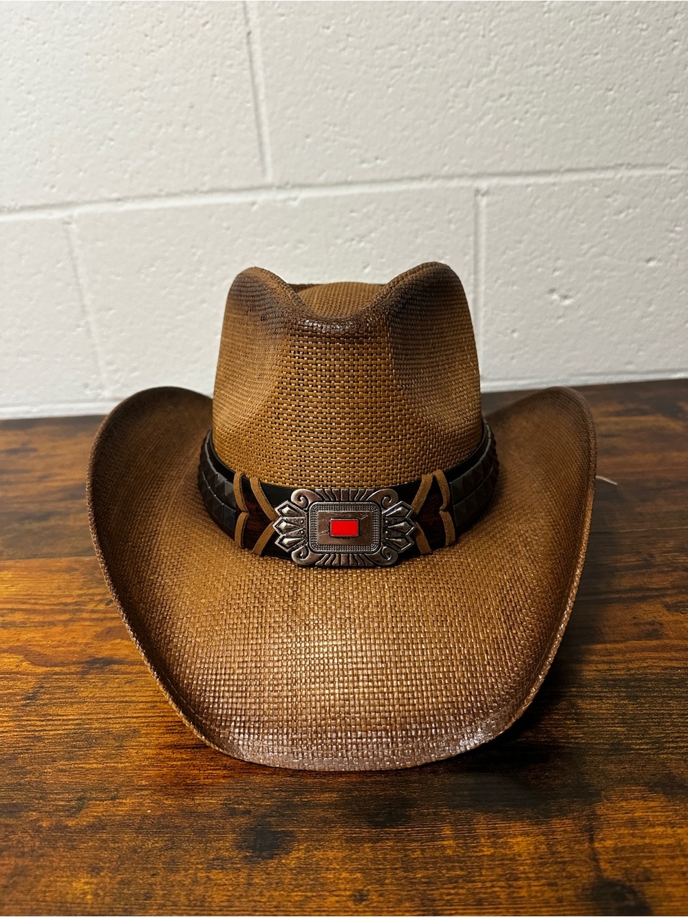 Brown Straw Cowboy Hat with Decorative Concho